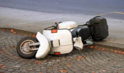 motor scooter hit by car